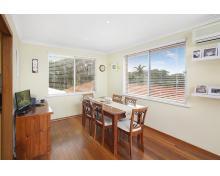  5 Katandra Place, PORT MACQUARIE NSW 2444 Whether you are wanting a well rounded home for your family or are searching for a rental property that will alot of appeal for prospective tenants this home is a must see. The location is good being situated in a quiet street, handy to town and the beach. The house has a solid brick and tile construction with a hardwood frame and hardwood floors. There is a front verandah, airconditioned lounge and dining, modern kitchen and 3 bedroom. An internal staircase lead downstairs to the double garage, workshop nook, laundry and second shower and toilet. The backyard has a Northerly aspect has a massive roofed patio area ideal for entertaining on a bi scale. The yard feels massive and will delight the kids, pets and is a clean slate for a keen gardener. A combination of large windows and good aspect means the home has an abundance of natural light and benefits from cooling breezes. Value @ $400,000 																					   