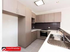  21/37 Orenco Bend Clarkson WA 6030 Conveniently located within 100m of the Clarkson train station and situated on the first floor, this light bright and modern 2 bedroom 2 bathroom apartment offers a high class level of living on a budget designed for the money conscious. Situated in a secure and low maintenance complex, this wonderful apartment features a tiled entrance that leads into a spacious open plan living and meals area, which opens up further via a sliding patio door that t leads out to a large tiled balcony, which is just perfect for relaxing on, during one of Perth's beautiful summer evenings.  The modern and well appointed kitchen features both below bench and overhead cupboards, a microwave and refrigerator recess, plenty of bench space and also comes complete with stainless steel appliances including and under bench electric oven, range hood, electric cook top and dishwasher. The ‘New York’ style laundry off the hallway includes a wall mounted clothes drier, laundry trough and space for a washing machine, and to the opposite side of the hallway you will find a large linen press and the one of the modern bathrooms, which features a full sized bathtub, separate shower and vanity. At the end of the hallway you will find the spacious Master Bedroom, including matching 'his and hers' built in mirrored door wardrobes, and a private modern ensuite, along with the second bedroom, which is double in size and also features a built in mirrored wardrobe. The apartment is kept at the perfect temperature all year round via the large split system air conditioning unit and also comes complete with a large lockable storage room that is located opposite the front door of the apartment, plus it also has a secure parking bay.  All this will enable you to live the lifestyle you crave without the stresses of budgetary restraints!  