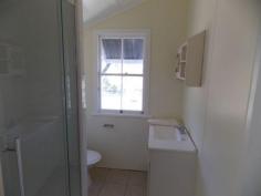 85 John Street, Rosewood, QLD - Bremer Valley Realty Two bedrooms + sleep-out & office 
* Lounge room with A/C 
* Modern kitchen open plan to dining with A/C 
* Renovated bathroom 
* Rear covered entertainment area 
* 878m2 block with room for a large shed 
* Walk to Rosewood shops & schools 