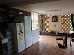  2000 Innisfail Japoon Rd Bombeeta QLD 4871 Are you looking for a change of scenery?  This 9.21 Ha (22.5acre) property is located just 3 km down the road from the Lovely Paronella Park and only 10 minutes south of Innisfail. Perfectly located this well equipped farm is conveniently close to primary and high schools, post office and local stores.  The main house consists of 3 bedrooms all with built-in wardrobes, large main bathroom and open plan kitchen/living/dining. The main living area opens out into a fantastic all-weather outdoor room, perfect for large BBQ's and gatherings. The addition of an extra room is the perfect space to be utilised as a craft room or office. The main part of the house has ducted air conditioning, with wall mounted air con units in each of the three bedrooms. Outside amongst the beautifully presented and easy to maintain gardens is an above ground pool for cooling down in the hot months. The large yard is fenced into three separate areas and includes a single car garage and a large 6 bay machinery shed with workshop and loading ramp. The yard also contains 1 x 5000 litre water tank, well and 2 septic tanks. Originally farming Cane, the property has progressed through banana farming and now prides itself as a cattle farm. Fully equipped the farm is made up of a cattle yard, 2 fenced paddocks with a lane way for moving cattle, running spring, bore water and Miskin Creek running through the paddocks that runs all year round.  Inspection is by appointment only so please call me today for more information and to book your private inspection. 