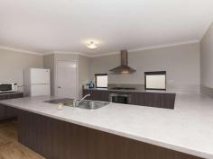  14 Mesa Link Baldivis WA 6171 Situated in sought after location in Tuart Ridge is where you’ll find this stunningly presented 4x2 plus study home. Features; *Double door entrance *4 Bedrooms—Master bedroom with large walk in robe. Other bedrooms can accommodate queen size beds also with walk in robes *2
 Bathrooms—Ensuite with double shower and his and her vanity units with 
china basins. Spacious main bathroom with shower, bath and vanity *Study/activity area conveniently near minor bedrooms *Separate carpeted theatre room with French doors *Huge
 kitchen with breakfast bar, stainless steel appliances including 900m 
gas hot plates, chefs oven, rangehood, dishwasher, fridge recess and 
walk in pantry *Open plan family/meals area *Games room with access to outdoor entertaining area, paved with quality Fremantle Stone pavers *Laundry with benchtop and trough *2 Reverse cycle air conditioning units to master bedroom and living area *Security alarm system *Double lockup garage with access to rear *Automatic reticulated gardens—off the mains *Garden shed *Block Size: 544sqm PERFECT FAMILY HOME 