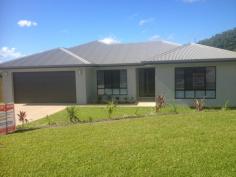 3 Pfeiffer Place Smithfield Qld 4878 Situated in the 
beautiful Canopy's Edge estate is this wonderful brand new family home. 
With sensational mountain views, the home consists of: - 4 bedrooms + media room - 2 bathrooms including ensuite - Fully tiled throughout - Fully air-conditioned with split systems - Large kitchen, gas cooking, dishwasher - Good sized yard f/fenced, room for pool - Fully landscaped - 2 Car electric LUG - No rear neighbours, backs onto reserve Located
 only a few minutes drive to schools, James Cook University, opposite 
Smithfield Shopping Centre and 15 minutes to the airport and city. This 
property has it all and would suit either live-in buyer or investor. 