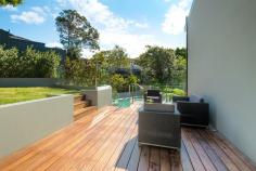  1 Talinga Pl Lilli Pilli NSW 2229 Quiet Style Sleek architectural lines, sophisticated contemporary style in a private elevated position, enjoying a pleasant natural outlook and sunny north aspect define this modern, multi level family residence. High Points - Land size 784sqm (approx.) - Multiple indoor and outdoor entertaining areas - Master retreat with ensuite on separate level - Solar heated salt water infinity pool	 - Private, level lawn and garden - Lower level gymnasium/home office - Double garage with internal access  - Quiet, quality family friendly locale 