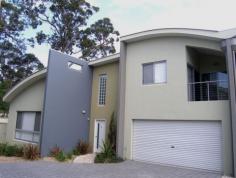 4/27e Gowlland Crescent, CALLALA BAY Great Investment opportunity, excellent rental returns, currently rented for $260 p/w 
* Modern design townhouse with stylish features, fresh clean look, 700m to Jervis Bay 
* Two bedrooms with joint balcony, built-ins, access to bathroom from main bedroom 
* Open plan dining and lounge create expansive living areas with vaulted ceilings 
* Quality modern kitchen, mezzanine office area over looks living areas, tiled floors 
* Private courtyard, double lock up garage with internal access, security gate entry 
* In a complex of five, visitor parking, F/H & Community title, levies $412 a quarter 
* Walk to shops, cafe, school, doctors, sports oval, park and 1min drive to Callala Bay 