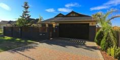  259 Kingsway Darch WA 6065 Looking for a stylish and spacious family home in a convenient location? Look no further as this is sure to please. Among the numerous attributes included are the following:- • 	 4 Good sized bedrooms, all with large robes • 	 2 Luxury bathrooms. The ensuite has corner spa bath & double vanities • 	 Modern kitchen with plenty of bench and storage space • 	 Large walk-in pantry • 	 Quality stainless steel kitchen appliances including dishwasher • 	 Coffered ceiling in family room • 	 Expansive open plan living, meals and kitchen areas • 	 Flued gas fire • 	 Separate games/theatre room with bar • 	 Ergonomic laundry • 	 Under main roof alfresco + covered patio at side of house • 	 Oversize double garage with access to rear garden • 	 Wet kitchen in separate building • 	 Shower room/3rd toilet at rear of house • 	 Reverse cycle air conditioning • 	 Timber floors • 	 Space for swimming pool • 	 Large easy maintenance gardens • 	 Roller shutters to front of house • 	 Fully fenced front garden • 	 Modern elevation • 	 Convenient location on bus route • 	 Close to schools & shops Perfect for the growing family so make sure you view this weekend so you are not disappointed. 