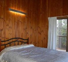  Witta, QLD, 4552 This one acre property (3917 sqm) is ideally situated, enjoying good elevation and a lovely outlook across Witta, as well as a high degree of privacy. The two bedroom timber house has loads of character with timber VJ internal walls and ceilings and polished hardwood floors. With 2 bedrooms and a single bathroom the home is suitable for a small family, couple or a weekender for the lifestyle buyer. With a full length verandah on two sides of the home, comprising new decking and balustrade, the outdoor living area takes in the view and offers a lovely aspect over the land. The kitchen and bathroom are original to the home and have been left that way for the new owner to change according to taste. With features such as high ceilings, exposed timbers, fireplace, verandah and a rolling hills outlook buyers will not be disappointed. The property is accessed by an all weather driveway which leads down to the garage, offering additional space for storage and workshop.  Rainwater storage is 8000 gallons split between two galvanized tanks. 