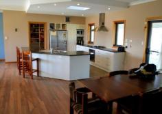 29 Geehi Circuit Jindabyne NSW 2627 Set on 1 acre this four bedroom, dual living zone home has a lovely northerly rural aspect. A very modern large kitchen family area separates the parents and children zones. Spotted gum timber floors with polished concrete heated floors through the wet areas and kitchen give the home a beautiful contract between the zones. A mixture of Gas, underfloor heating and hydronic heating keeps the home warm in winter along with the north penetrating sunshine. All the windows are double glazed and the hot water is solar with an electric booster. Out back for the bloke is a 11m x 9m shed and plenty of room for the family to run about. Features     Outdoor entertainment area     Fenced     Indoor entertainment area     Verandah     Smoke Alarms     Oven     Hot plate     Range hood     Dishwasher     Solar hot water system     Heaters Property Details Bedrooms        4 Bathrooms        1 Ensuites        1 Garages        4 Land Area        1 ac          Agent Details      Michael Henley Director Phone - 0264562562 Mobile - 0403 165 563
