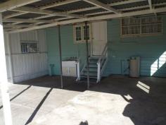 85 John Street, Rosewood, QLD - Bremer Valley Realty Two bedrooms + sleep-out & office 
* Lounge room with A/C 
* Modern kitchen open plan to dining with A/C 
* Renovated bathroom 
* Rear covered entertainment area 
* 878m2 block with room for a large shed 
* Walk to Rosewood shops & schools 