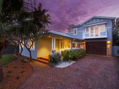  20 Cliff Rd Collaroy NSW 2097 Nestled in one of the Northern Beaches 
most prestigious and peaceful enclaves, this beautiful home enjoys the 
essential elements of contemporary Australian seaside living. 
 
Features Include: 
 
- Combining the original character of Collaroy Basin architecture with modern style and 
 space, designed for an elegant but relaxed lifestyle 
 
- Spacious living with vaulted ceilings and warm chocolate floors flow through bi-folds 
to a sundrenched north facing private travertine terrace 
 
- Stunning kitchen designed to bring family and friends together around the ideal island 
bench complimented with stunning stone tops and ILVE oven will make cooking a joy 
 
- The terrace is a natural extension to the living area and is surrounded by level lawn and mature 
tropical garden 
 
- On the entry level is a generous queen bedroom with sitting area, bright single bedroom or 
study and the main bathroom which features a bath and stunning Italian floor tiles 
 
 - Main bedroom with large built in wardrobes and doors opening to a lovely sunny east 
facing balcony creating a wonderful air-flow 
 
- Oversize lock up garage with auto entry and room for storage has internal access 
 
 A pretty facade, this is the ideal home for those who want to live just
 metres to the surf and Long Reef in modern beach house in style and 
comfort. 
 
Council Rates:$855.99 per quarter 
Water Rates:$176.00per quarter + usage 
 
Contact 
 
Gordon Spring 0418 210 219 gspring@ljhooker.com 
Kim Jeffery 0410 553 919 kjeffery.collaroy@ljh.com.au 
 
   Read more at http://collaroy.ljhooker.com.au/NPQF6Q#4S4KczQgDIUXsMqf.99 