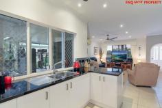  13 SHELL CLOSE KEWARRA BEACH QLD 4879 This very tidy property ticks all the boxes. There is a large list of features that makes this property stand out from the crowd. Positioned on a private 934 sqm, fully fenced block with a sparkling , 9 meter 50,000 ltr in-ground pool, this Ash Moseley built home of generous proportions is now ready for the red hot market. This idyllic retreat in serene surrounds is within walking distance to the beach.  