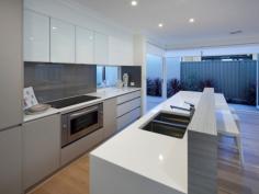 18 Hollington Gardens Butler WA 6038 We know it’s important to have all the room you need, but it’s also 
essential to be able to use that space to perfectly complement your 
lifestyle. The Affogato offers vastness and clever design, so you can 
make the most of your home. 
 For extra space, the bi-fold doors seamlessly merge the 
kitchen/dining/living into the alfresco area. For movie night, gather 
the family into the purpose-built home theatre. And when you need your 
own space, head upstairs to the parents’ retreat. 
 Plus, everybody’s clothes even get their own space, with all bedrooms featuring walk-in-robes! 
 Features 
 4 bedrooms, including master suite, all with WIR’s. 2 bathrooms Gourmet kitchen with island bench Study & IT nook Double auto garage, with shopper’s access 