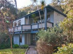  32 Richard Rd Scotland Island NSW 2105 This neatly appointed two storey home baths in sunlight and needs 
nothing spent except to move in and enjoy the perfect Pittwater 
lifestyle. 
 This home provides privacy and space and would be ideal for a family as it consists of four bedrooms and two living areas. 
 The upper level consists of the light and bright main bedroom, the 
bathroom, an open plan lounge/dining room, a wrap around balcony with 
Pittwater views and a large private entertaining deck. 
 The lower level has three bedrooms, a second living area and a second toilet. 
 Complete with a large garden shed, landscaped gardens and a flat grassed area. 
 Conveniently located with only a short walk to the public wharf. 