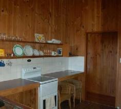  Witta, QLD, 4552 This one acre property (3917 sqm) is ideally situated, enjoying good elevation and a lovely outlook across Witta, as well as a high degree of privacy. The two bedroom timber house has loads of character with timber VJ internal walls and ceilings and polished hardwood floors. With 2 bedrooms and a single bathroom the home is suitable for a small family, couple or a weekender for the lifestyle buyer. With a full length verandah on two sides of the home, comprising new decking and balustrade, the outdoor living area takes in the view and offers a lovely aspect over the land. The kitchen and bathroom are original to the home and have been left that way for the new owner to change according to taste. With features such as high ceilings, exposed timbers, fireplace, verandah and a rolling hills outlook buyers will not be disappointed. The property is accessed by an all weather driveway which leads down to the garage, offering additional space for storage and workshop.  Rainwater storage is 8000 gallons split between two galvanized tanks. 