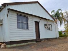  64 Simpson Street Mount Isa Qld 4825 Walking distance to the CBD, this property is perfect for the small business. Situated at the rear of the property is a large workshop with bathroom and toilet and is suitable for day to day business Redevelopment opportunity 1012m2 block close to schools Ideal for units 2 separate sheds, 3 phase power 2 bedroom dwelling on the property Features     Air conditioning 