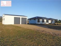 Yengarie, Qld 4650.
Built by 2014 Master Builders Award Winner Dirran Knight (Knight 
Constructions Qld) – winner of the 2014 Burnett Wide Bay "Rising Star 
Award”, this lovely and new four bedroom home is waiting for its new 
owners. 

 Positioned towards the rear of a three acre fenced allotment which 
comes complete with a three bay shed and a lovely rural outlook, it 
won’t be waiting long! 

 Just completed this four bedroom home is located approximately ten minutes from the CBD. 

 The main bedroom features an ensuite with dual shower and walk-in 
robe while the additional three bedrooms all have built-in robes. 

 Quality fixtures and fitting and floor coverings have been installed 
throughout. The kitchen, dining and lounge area is open plan in design 
and large modern tiles feature throughout the main traffic areas. 

 The custom built kitchen which overlooks the rear deck boasts plenty 
of bench space, dishwasher and a generous pantry. The rear hardwood 
deck/entertainment area is fully lined, has lights and a ceiling fan and
 is positioned to catch the afternoon breezes. The outlook across the 
neighbours dam is lovely to look at while entertaining family and 
friends. 

 There is underground power to the house and a large 10.6m x 7.5m shed
 takes care of vehicle accommodation and workshop requirements. 

 “Brand new and waiting for you.” 
 