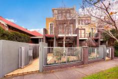  733 MOUNT ALEXANDER ROAD MOONEE PONDS TRI LEVEL DELIGHT OVERLOOKING QUEENS PARK Redefining modern living, this family sized townhouse is sure to excite with its innovative floor plan, stunning interior and sought after location. Boasting a contemporary facade providing instant street appeal this impressive home offers;  -4 genuine double bedrooms (all with BIR's, 2 with private balconies) -2 pristine bathrooms  -Additional powder room downstairs  -Contemporary kitchen with stone benches & s/s smeg appliances -Combined living/dining opening to a private, sunny courtyard  -Spacious, separate formal living zone drenched in natural light -Laundry with ample cupboard space  -Complemented by ducted heating & refrigerated cooling, house intercom monitor, security alarm, under stair storage and double carport via ROW Situated in one of Moonee Ponds' most popular pockets directly opposite Queens Park and with immediate access to public transport, local primary & secondary schools and Puckle Street shop & cafes.  Don't miss this exceptional opportunity.   