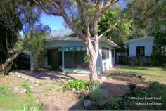  92 Machans Beach Road Machans Beach QLD 4878 This property is an absolute surprise. Although only having one internal bedroom with a detached additional bedroom, it has real character and is disarmingly charming.. The main dwelling consists of one generous bedroom with built-ins, a large open plan lounge and dining room with a very functional kitchen. A large undercover patio holds access to the bathroom and laundry with the detached 4mtr X 4mtr bedroom also accessed from here. Positioned well back on the 809m2 block, away from the road, it provides a huge front yard with heaps of room for the kids to play footy or whatever. This property is on fixed term lease until August so inspections are by appointment only. The caring tenant has been in place for four years and would LOVE to stay on if you are thinking of this as an investment, but it would equally suit a couple wanting a beach escape in one of Cairns' most sought after Northern Beaches suburbs or simply starting their property portfolio. Seriously for sale, interstate owners are rationalizing investments and offers around $300,000 will be looked at very favourably. To easily make an OnLine Offer to buy this property, simply visit the Betta Real Estate Web Site and click on the red "OfferOnline" icon on this property's profile. Your offer will be acknowledged and immediately forwarded to the sellers for their consideration. Your offer will not be disclosed to other buyers. 