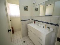  15 Binalong Street, Dalmeny NSW 2546 Immaculate three bedroom home with renovated bathroom and kitchen. Two x large garages, covered BBQ area, fully fenced yard and access from 2 streets. A nice flat block and easy walk to the sports ground and bowling club. Move on in and start relaxing!! 