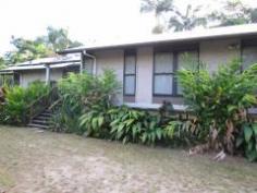  489 Gorge Road FINCH HATTON Qld 4756 Live in a lush tropical paradise amongst the rainforest in this beautifully set 5 acre property with permanent running fresh water stream and tropical low maintenance gardens. Listen and watch the running water cascade over the rocks and stones while you relax on the large under cover timber deck. This home is in excellent condition and includes 4 good-sized bedrooms, 2 with built-ins and main with W.I.R. and ensuite. Also includes a separate office and large open plan living/ dining area. The well appointed kitchen features stone benchtops, gas oven and 5 burner cooktop, dishwasher and pantry. This all opens out to the large, covered entertaining deck area. The eco friendly design boasts extra large eaves with excellent ventilation, solar hot water and solar electricity, ceiling fans and split system air-con to living and main bedroom. Two large water storage tanks and a double bay shed are also included with this property. Call for your inspection. 