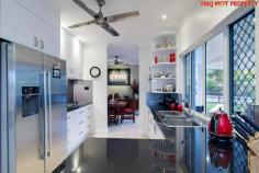  13 SHELL CLOSE KEWARRA BEACH QLD 4879 This very tidy property ticks all the boxes. There is a large list of features that makes this property stand out from the crowd. Positioned on a private 934 sqm, fully fenced block with a sparkling , 9 meter 50,000 ltr in-ground pool, this Ash Moseley built home of generous proportions is now ready for the red hot market. This idyllic retreat in serene surrounds is within walking distance to the beach.  