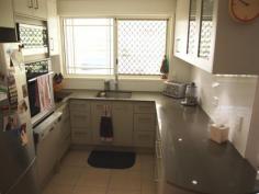  3/35B Wentworth Terrace The Range QLD 4700.Located on the ever 
popular Wentworth Terrace with a lush garden path providing access to 
Agnes Street, this well designed, single storied unit would be ideal for
 investors, first home owners or those looking to downsize. 
 
# Air-conditioned master bedroom has walk-through robe to two-way bathroom 
# Two other good sized bedrooms with built-in cupboards 
# Open plan lounge with split system air-conditioning 
# Functional, modern kitchen with plenty of storage and bench space 
# Spacious, covered rear deck ideal for entertaining & watching glorious sunsets 
# Single lock-up garage with access to kitchen 
 
This low maintenance unit combines modern style with the functionality 
of a spacious layout and ample storage. Priced to sell, arrange your 
inspection TODAY! 
 