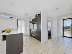 1 Tangelo Court Bellmere Qld 4510 The Perfect First Home.....
				 What a gorgeous find in Bellmere! 
					Modern, bright, spacious and fresh, this four year old gem is 
close to shops, schools and everything your family could need for 
convenience. 
Situated on a generous 601m2 of lawn, the home is impeccable, inside and
 out. Three bedrooms and two bathrooms mean Mum and Dad can have their 
private space and the kids can have theirs. The remote control garage 
door lifts to reveal space for two cars or a car and a boat thanks to 
the easy access driveway. 
Enjoy cooking up a storm in the stylish kitchen, equipped with quality 
appliances and island bench. The kitchen, dining and living rooms are 
filled with natural light thanks to the four ceiling-height glass panels
 and double sliding doors that open out to the covered entertaining 
area. The home's total undercover area is a spacious 201.41m2. 
Split system air conditioners keep the living area and master bedrooms 
cool and warm throughout the year. Ceiling fans, vertical blinds and 
security screens are installed throughout the house. 
All the bedrooms are carpeted while the common areas are tiled for low maintenance and easy cleaning. 
Surrounded by other lovely homes in a similar style, you will feel a 
part of the neighborhood immediately. But don't leave it to another 
lucky family to snap this one up. It is scheduled for auction but 
inspect now and you can call it yours even sooner.