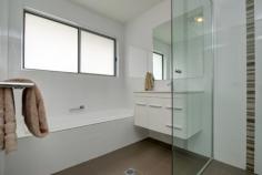 26 Brennan Ct Coffs Harbour NSW 2450 Property ID:     39P1627 Property Type:     House Land Size:     832m² approx. Bed     4 Bath     2 Park     2 Construction:     Brick Outgoings:     Council Rates: $2654 / yr Features     Built-In Wardrobes     Ensuite     City Views     Ocean Views     Remote Garage     Deck     Outdoor Entertaining Area     Fully Fenced     Dishwasher     Floorboards Try
 to contain your excitement when you enter this impeccable, quality 
built home! Boasting breathtaking mountain views, a city skyline, ocean 
glimpses and the finest level of appointments...nothing has been 
overlooked in creating this mere 1 year young home...just perfect for a 
professional couple or family. Featuring a light filled designer kitchen
 with stone benches and stainless steel appliances, Grand Oak flooring, 
"smart glass" energy efficient windows and a spacious open plan living 
& dining area. This beautiful home also comprises of three bedrooms 
upstairs, the master providing a full ensuite, walk in robe and access 
out to the fantastic under roofline deck. Downstairs discover an 
oversized 4th bedroom currently being utilised as a training centre due 
to the separate entrance it offers to clients. On a private 832sqm fully
 fenced block that has been landscaped for low maintenance living, 
relaxing is easy as there is plenty of space for the kids while you sit 
back and enjoy the outlook. Completing the house is a remote double lock
 up garage and plenty of storage. One inspection is all you will need to
 appreciate that this home has been stylishly built with the finest 
attention to detail. This property is strictly inspection by appointment
 so contact us today to arrange a time....as tomorrow might be too late!