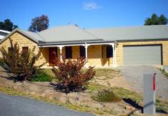 16 Red Gum Pl Goulburn NSW 2580 Goulburn address available on request  The unassuming stone exterior of this large quality home does not reveal what is within. Offering 4 bedrooms all with built-ins, ensuite to the master, a huge open lounge, a separate dining room, an entertainment room, a magical kitchen with granite benchtops & walk-in pantry, 3 toilets with floor to ceiling tiled bathrooms & marble benchtops, in-floor hydronic heating, extensive use of floor tiles – no carpets, cedar exterior doors & windows, woodweave blinds throughout, attached drive through garage with remotes & internal access. Tucked away in a quiet cul-de-sac, this home was built by a local craftsman to the owner’s requirements, it exudes quality & has new home warranty. Owner moving due to family commitments. Inspection by appointment only.     General Features     Property Type:House     Bedrooms:4     Bathrooms:3     Building Size:2,814.96 m² (303 squares) approx     Land Size:819 m² (approx)     Indoor Features     Ensuite:2     Living Areas:2     Toilets:3     Built-in Wardrobes     Dishwasher     Hydronic Heating     Outdoor Features     Remote Garage     Secure Parking     Garage Spaces:2     Open Car Spaces:2     Courtyard     Eco Friendly Features     Water Tank     Other Features     Drive through garage 