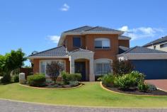  2 Parish Ln Churchlands WA 6018 Located only a few metres from picturesque Herdsman Lake and wildlife reserve 
within whisper quiet Floreat Lakes Estate this immaculate two storey family home 
offers a relaxed "country lifestyle" in a very convenient location surrounded by 
an abundance of nearby public amenities, glorious coastline and the city centre. 
 For further details or to view this lovely home please call IAN FATHARLY 
on 0411 886 183. ACCOMMODATION AND FEATURES First 
Floor *Covered front porch and double door front entry opening into double 
height reception foyer with gleaming polished floorboards *Formal 
lounge/sitting room *Large formal dining room/study or theatre 
room *Spacious open plan family room/meals and kitchen with sliding external 
doors opening onto the alfresco area *Country style kitchen with gas 
hotplates, under counter oven, large fridge recess, pantry and Miele 
dishwasher *Separate laundry... 