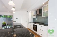  110 Lawler Street Subiaco WA 6008 White Hot! 

 This elegant and modern town home packs a punch once you step through
 the door.  It offers loads of northerly light, a spacious well 
thought-out layout, new quality fit-out, secure double parking, decked 
outdoor entertaining area and all on a Green Title in one of Old Subi’s 
most loved streets. When compared to buying an apartment of similar size
 and fit-out this makes excellent buying - be it as a home or an 
investment – and... did we mention it was Green Title?? 

   

 Location: 

 This property is situated in one of Subiaco’s favourite streets, on 
the northerly side.  It is within metres to the bus stop and Daglish 
train station and a short walk to parks, cafes, restaurants, shops and 
all the fabulous facilities on offer in Subiaco.  It provides easy 
access to UWA, the city and the river, hospitals and the freeways north,
 south and east. Walk score 77! 
										
										 Features 
										 3 bedrooms 2 bathrooms (one ensuite) Powder room 3 WC's Lounge Open plan living/dining/kitchen Laundry Double garage Decked courtyard Features: Solid timber floors downstairs Stainless steel balustrading to solid timber staircase Samsung ducted reverse cycle air conditioning Brand new kitchen with stone island bench, double sink, gloss white
 cabinetry, walk-in pantry, integrated Liebherr fridge/freezer, 
microwave recess, glass splash back, ASKO five burner gas cook-top, 
range-hood, electric oven and dishwasher Carpeted bedrooms Master bedroom with fitted built-in robe and balcony; ensuite with 
separate bath and shower with frameless glass screen and double vanity Large, sunny balcony off Master bedroom Stone tops and floor to ceiling tiling in all bathrooms Bedrooms 2 and 3 with built-in robes Ducted vacuum system Visual intercom system Laundry with good storage and direct access to the outside North facing decked courtyard Automatic reticulation 
