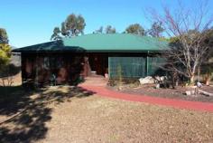  5 Clarke Close Gloucester NSW 2422 The warm feel of timber is a feature in this 3 bedroom home which sits on a large 1639 square metre block of land. Set back from the road in a small cul de sac away from traffic noise the outdoor entertaining deck overlooks a large yard with a separate car garage. Inside the home an open living area welcomes you with the hallway leading to 3 bedrooms and a 2 way bathroom. 2 Air conditioners, ceiling fans, polished blue gum flooring and a modern timber kitchen complete the package. 