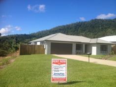 3 Pfeiffer Place Smithfield Qld 4878 Situated in the beautiful Canopy's Edge estate is this wonderful brand new family home. With sensational mountain views, the home consists of: - 4 bedrooms + media room - 2 bathrooms including ensuite - Fully tiled throughout - Fully air-conditioned with split systems - Large kitchen, gas cooking, dishwasher - Good sized yard f/fenced, room for pool - Fully landscaped - 2 Car electric LUG - No rear neighbours, backs onto reserve Located only a few minutes drive to schools, James Cook University, opposite Smithfield Shopping Centre and 15 minutes to the airport and city. This property has it all and would suit either live-in buyer or investor. 