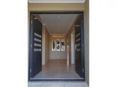  7 Stint Pass Tapping WA 6065 Be quick to inspect this beautifully presented and well finished 4 bedroom, 2 bathroom plus study, games and theatre family home situated on a quiet street close to major shopping centres, parks, schools and the beach! The Interior: Master Bedroom with his/hers walk through robes and ensuite with double shower 3 spacious rooms with built in robes Main Bathroom includes bath, large shower, and separate toilet Large island bench kitchen with stone bench tops, ample storage, double fridge recess, double panty, stainless steel appliances and dishwasher! Separate theatre (optional theatre recliners and entertainment unit included) Separate activity/study area Large open plan lounge/dining area with floating floors throughout Separate Games room Large laundry with linen storage and built in wash through Full block out roman blinds to main living areas and bedrooms, full blockout drapes to theatre/master Monitored alarm system including remotes along with secure safe installed Intercom system in working order Split system air conditioning unit 