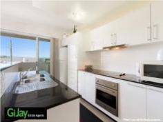 Unit 3/80-86 Tenby Street Mount Gravatt QLD 4122 Are you the pickiest, most self-indulgent buyer in Brisbane? If you are, you'll feel right at home here.  This apartment is on the ground floor and it has a private court yard with security. It Boasts 2 large bedrooms, 2 bathrooms one of which is a large ensuite, one car space with plenty of room for possible storage area, 3 balconies - front balcony with mountain views and a rear balcony looking out to the huge common use courtyard, stainless steel European appliances in big open plan kitchen. • 2 Big bedrooms + study/3rd balcony  • 2 Bathrooms (master with en-suite)  • Huge balcony  • Air-conditioner  • Dishwasher  • Security entry doors  • Secured parking with remote control  • Granite bench top with stainless steel European appliances kitchen  • Huge common use courtyards for kids to play safe Just within 10 minutes walk to local cafes, restaurants, uni & express city buses, Griffith University, public & private schools and only approximately 10 kms to CBD. 
