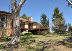 3 Camira Ave East Jindabyne NSW 2627 Located in a quiet East Jindabyne cul-de-sac, this 3 bedroom 1.5 bathroom north facing brick veneer home is set high on the hill with breath taking views of Lake Jindabyne and the Snowy Mountains. An entertainerâ€™s kitchen with Miele appliances opens onto the living and dining area. The large north facing deck has ample room for outdoor furniture and BBQ, and the view!! The large master bedroom has full length windows and all bedrooms have built in wardrobes. The bathroom has a shower recess, spa bath and toilet, and there is another separate toilet next to the bathroom. In floor ducted heating is installed throughout the house, and there is a reverse cycle air conditioner in the living room. Recently installed double glazed cedar windows ensure the home remains cool in summer and warm through the winter months. The laundry is internal and there is a large separate entry room via the concrete driveway with double garage. The home is set on 2,200m2 with an easy to maintain garden and lawn. It is fully fenced and dog proof. Features     Outdoor entertainment area     Fenced     Verandah     Low maintenance     Undercover outdoor area     Oven     Hot plate     Range hood     Dishwasher     Gas hot water system     Air conditioning     Heaters Property Details Bedrooms        3 Bathrooms        1 Garages        2 Off Street Parking        2 Land Area        2200 m2          Agent Details      Michael Henley Director Phone - 0264562562 Mobile - 0403 165 563