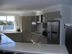  5-7 Blueberry Street Banksia Beach Qld 4507 OLF COURSE ESTATE QUALITY LIVING BELOW BUILD COST This four bedroom golf course estate property is a must to view. The property offers huge side access for caravan, boat or trailer and room for a pool. Add to this ducted air conditioning, media room, all bedrooms are large with built ins and 9 feet ceilings throughout. Outdoors entertain on your large timber entertainment deck.  