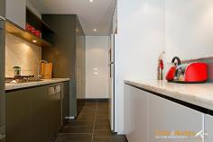 511/21 Marcus Clarke Street City ACT 2601 B quick to inspect and purchase this executive 2 bedroom apartment in to this boutique Fender Katsalidis designed complex, showcasing inner-city living at its very best, as a new long term lease has just been signed. NewActon East is arguably one of Canberra's best located, most thoughtfully designed and exquisitely fitted-out complex. Featuring high level inclusions such as top-end Miele appliances, wireless internet access, high-level security, including basement car parking for two cars and environmentally responsible features throughout. The apartment is spacious and well designed with large built-in robes, a luxurious ensuite, double vanity, bath and separate shower. Generous sized dining and living areas flow onto a spacious balcony which is ideal for indoor outdoor living and entertaining. The current lease ($700.00 per week, fully furnished) is ending at the end of August 2014 and offers vacant possession for the live-in buyer or great investment opportunity for the astute investor. NewActon East is conveniently located within a short walking distance to the city centre, the Australian National University, Government departments, Commonwealth Park and Lake Burley Griffin. 