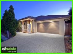  30 Forrestal Circuit North Lakes Qld 4509 Be the envy of all your friends when they visit your lavish North Lakes retreat. Watch sport from the bar, spa or outdoor living area. Mood lighting and a music system is complimented by a flickering fire. Coming home to this address every evening will take away all the stress of a hard day at work and set the stage for a quite evening. Then come the weekend switch into party mode and celebrate. This Masterpiece boasts * 4 Architect designed spacious bedrooms * King sized master with a spacious ensuite with double vanity's, walk in robe & built in robe. * Designer kitchen with stone bench tops, 900mm stainless steel gas stove, dishwasher, built in microwave & large pantry. * Separate formal lounge with a gas fire place. * Large games or entertainment room with a wet bar with bi fold servery windows opening out to the entertainment area. * Separate meals area which opens up to the covered entertainment area. * Beautiful timber floors throughout the home. * Ducted air-conditioning, music system, intercom with camera. * CBUS system for that soft element lighting throughout. * Large private entertainment area with timber decks & timber ceilings. * Outdoor spa area, BBQ area, water feature. * Low maintenance garden with that tranquillity feel. * Large 688m2 block. 