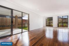  13 Jackomos Street, Bonner ACT 2914 This home offers a truly lavish lifestyle with a list of features you have only dreamt about. Upon completion, you'll enjoy the space & luxurious fittings of this residence on a hill top location near local shops & school in brilliant Bonner. Upon entering the home you will be greeted by the segregated formal living area. Making your way through this aesthetically pleasing space you then find yourself in modern kitchen area. The stylish kitchen boasts stainless steel appliances, stone bench tops & an abundance of bench &cupboard space. Continuing your way through this marvellous residence you will be pleasantly surprised by the extra-large family & meals area. Flowing out from the family area is the additional outdoor area that is ideal for the entertaining family & friends. The secluded main bedroom is located upstairs & boasts a walk-in robe & well appointed ensuite with designer finishes. All the bedrooms are generously sized & include built-in robes. The 2nd ensuite is attached to another bedroom for convenience. Year round comfort is assured with the inclusion of ducted reverse-cycle air conditioning throughout. This home is complete with auto double garage with internal access & floor coverings. The home is based on the concept of modern living near local facilities. Walking & bicycle tracks are just a stone's throw away with amazing hill top views. 