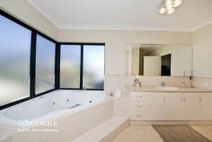  4 Algarve Way Hillarys WA 6025 Set on the high side of the street and beautifully presented ,this quality built double storey family home on a 670sqm block offers a spacious and versatile floor plan and is situated in the sought after Harbour Rise Estate just a short stroll to the beach and Hillary's Marina.    A spacious kitchen with granite bench tops and loads of storage overlooks the open plan family and dining areas that open out onto the timber lined alfresco entertaining space and private easy care backyard and pool.The entertaining zones continue with an activity room with built in bar with stone bench top,a large home theatre and courtyard comprising a Mediterranean wood-fired oven .   The laundry has plenty of storage,outdoor access and shoppers entry via a remote-controlled double lock up garage.    This home has four good size rooms all with built in robes. The master suite featuring a walk in robe,spacious en-suite with a 7 jet corner spa and separate powder room .  There is also a large home theatre that opens onto a timber lined balcony with a coastal outlook with ocean glimpses as well as a good size study .     A full perimeter alarm, ducted reverse cycle air conditioning, gas hot water system and fully reticulated gardens with side access finish this fabulous home . All of these features combined with this home's proximity to the beach, Hillary's Marina, park lands, top schools, shopping and transport means that this property won't last long . 
