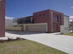  2/52 Spinnaker Heights Yangebup WA 6164 this luxuriously appointed executive  town house has it all 3 large bedrooms 2 bathrooms  gourmet kitchen with stainless steel appliances ,  that overlooks the open living area with solid timber floor boards . this luxuriously appointed executive  town house has it all 3 large bedrooms 2 bathrooms  gourmet kitchen with stainless steel appliances ,  that overlooks the open living area with solid timber floor boards . All the bedrooms and separate lounge   are on the upper level and a large balcony runs of the lounge , giving absolute stunning coastal views from its elevated position. Close  to Cockburn central shopping centres , transport and minutes away from the ocean , this truly is easy living at its best 