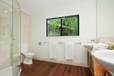  10 Queenley Close Edge Hill QLD 4870 Powe Property is excited to present this unique residence in popular Edge Hill. This property has many options to buyer as there are basically two houses in one therefore it would suit families with teenagers, extended families, corporate couples or the investor. Features include: - Private location, tucked behind Botanical Gardens and Tanks Art Centre, walk to Cafes and Shops - Large open plan covered deck area with private dining wing and plunge pool, perfect for Cairns lifestyle - Open plan living area upstairs with polished timber floors - Brand new bespoke kitchen with Highland gas cooktop, Asko chef oven and Miele dishwasher - Upstairs - two double bedrooms, main with ensuite and 2nd bathroom - Downstairs - two double bedrooms, bathroom, 2nd living area and full kitchen - Two street frontage with 3 car lockup garage - Quite cul-de-sac location, tucked amongst the trees - Back yard fully landscaped and fenced with auto watering system 