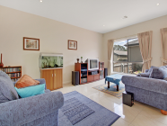  2 Reynolds Street Curtin ACT 2605 Only 10 years old this charming townhouse, set in a small complex, is ideal for those who have a busy lifestyle; whether you are working hard to pay off your first home, or busy traveling while retired. This is a property you won't have to spend hours in gardening or maintaining. Having just one owner this home has been well looked after. Now vacant the owners are keen for the next owners to be found.  Inside offers neutral colour schemes, tiled living areas and a kitchen with stone bench tops and stainless steel appliances. Entertain a larger crowd outside with the large north facing deck, private from the neighbours.  