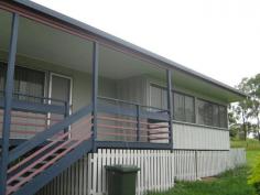  17 Queen Street Dallarnil QLD 4621 File 2986. Delightful 3 Bedroom Low Set Fibro Cottage in the small Country Township of Dallarnil on 1/2 acre block of land. A short walk to the Primary School & Local Store. Situated in a lovely Quiet part of Town app 25 minutes to Historic Childers & a further 10 minutes to Country Township of Biggenden. This lovely Cottage has recently been renovated & has been freshly painted throughout. * 3 Bedrooms. 2 With Built in Cupboards. * Polished Timber Floors Throughout. * Open Plan Dining/Kitchen/Lounge. * Bath with Shower over head & Basin. * Separate Toilet. * Built in Linen Cupboard. * Kitchen with Breakfast Bar & Electric Stove. * Front Verandah & Rear Deck. * 5,000 Gals Rain Water Tank & Fenced on 2 1/2 Sides. 