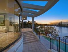  9 Ipsley Dr Broadbeach Waters QLD 4218 Quality residence ‘Builder of the Year’ award. Exclusive extra large home in a very desirable part of Broadbeach Waters. Conveniently located within proximity of Pacific Fair Shopping Centre, 3 Golf Courses and Beach. High ceilings give a very spacious feel throughout.   5 bedrooms 5 bathrooms master with spa ensuite. Extra large Kichen with European Appliances. Lounge ,Sep Dining and  Family room Separate Office Monitored Security System Underfloor Heating 5kw Solar Power System Swimming Pool Double Garage     Self contained Guest  1 / 2 bedroom Apartment Full Kitchen with European Appliances Lounge / Dining Double Garage 