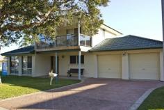 2/32 Farm Rd Fingal Bay NSW 2315 One Block Back From the Beach. Holiday Hacienda Carefree holidays or spacious home, the size of this duplex will amaze you. Huge open plan living and dining plus massive kitchen. Tiled floors, so mum won’t fret when when the swimmers are still wet. Three generous bedrooms, two up and one down. Three bathrooms, including disabled access bathroom off the garage – handy when the hoard return covered in sand. Sun drenched balcony, fully fenced and paved courtyard, complete with fish cleaning facility. Tennis courts, track to the beach and oval on the other side of the road. This home is what Fingal is all about. You, your family and friends will spend many happy days here.   Property Features     2 x Garage Spaces     3 x Toilets     Balcony     Built in Wardrobes     Courtyard     Dishwasher     Outdoor Entertaining Area     Shed