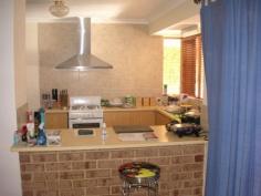 15 Angalore Road MADORA BAY  WA 6210 Big 800 sqm Elevated block with Heaps of Space to Park the Boat, Caravan
 or Trailer plus 5 cars! Boasts a Carport with Roller door plus separate
 Double Gate Access to huge Workshop or Double Garage. House is a 
spaciuos Modern Brick & Tile with 4 Bedrooms & 2 Bathrooms, 
Formal Lounge or TV room,, Large Family Living, Open plan Dining, 
Central Kitchen with Breakfast bar, Patio, Paved Entertaining area and 
enclosed Rear Garden. Features some lovely Light Fittings, Cedar Blinds,
 near new Stove, Rangehood, Security Screens, Solar Hot Water, R/C 
Aircon in Family area, plus Bore. Currently tenanted for $440 pw, who 
would like to stay on, if possible. Peaceful Old Madora Location, only a
 short stroll to the Deli, Park & the Beach ! 