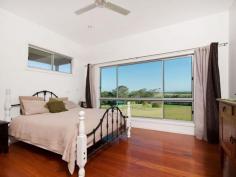  304 Iluka Rd Woombah NSW 2469 River Frontage With Endless Valley ViewsThis outstanding riverfront home enjoys an exclusive position on the Woombah ridge overlooking the valley and Clarence River. Imagine sitting on your deck, or even from the many vantage points within the home, and watching the weather patterns change and move across the valley.  The home is approximately 5 years young and sits on 1.446 ha (3.5 acres) of land adjacent Clarence River tributary. Catch fish, mud crabs or launch your runabout directly from your own land.  The contemporary modern home has many features including Caesar stone bench tops, shadow line cornices, soundproofed media room, insulated walls and ceiling. Loads of garaging, workshop and easily converted studio or guest accommodation an added bonus. While owners will miss living here, the time has come and they must move on. Call, inspect and make your offer on this beautiful property today. 