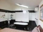  36 Anglers Dr Bateau Bay NSW 2261 hobby rooms and all accessed from garage area. Off 
street parking for another 4 vehicles and space for your caravan. The 
home sits adjacent to a reserve and allows for privacy and the feeling 
of owning an acreage.
			
				
			 
