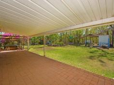 965 Goode Road HUMPTY DOO NT 0836 Start your rural ambitions with this three bedroom home located on a few acres not too far from the Humpty Do shops. Settle in and enjoy this established property that requires only minimal upkeep. Nestled amongst the native vegetation and surrounded with lush green lawns, it is cool and perfectly designed for the couple or the family to move right on in. Raked ceilings add to the specious feel of this open plan living, dining and kitchen area. Painting throughout in neutral whites with tiled flooring as well as air-conditioning, those spaces have been thought out and designed to make the most of the Territory Lifestyle. The kitchen features wrap around counters and a long breakfast bar with seating for 4, a pantry provides ample storage while overhead cupboards, under bench storage plus a fridge nook all complete this functional and elegant kitchen. All three bedrooms are a great size, bedrooms 2 and 3 both feature a built in robe with air-conditioning and tiled flooring while the master is complimented with his and hers built in robes and a two way bathroom acting as an ensuite. The bathroom feats a relaxing bath tub that you could fill with bubbles and take a moment to unwind in, or let the kids slash about for night time baths. Duel linen presses provide a wealth of storage for those extra towels and linen. At the rear of the property is a private in ground spa with an arbour overhead and a brightly coloured bougainvillea winding its way through the eaves. Shade sails provide protection from the sun and a tropical garden bed adds to the privacy. Accessible from the rear verandah, the kids can play in here as you keep an eye on them, or wait for their bedtime for a relaxing twilight dip of your own. 